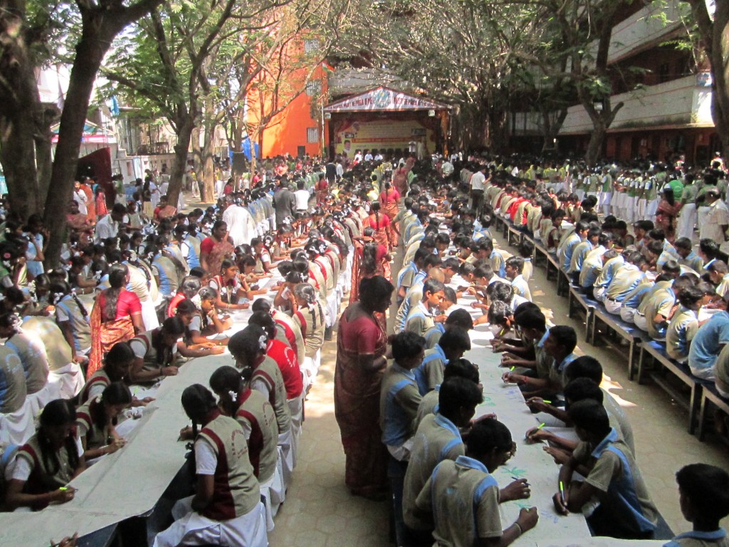 MOST CHILDREN CONTRIBUTED TO THE PAINTING OF SAME SLOGAN SIMULTANEOUSLY