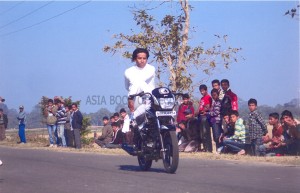 MOST CONSECUTIVE YOGA POSTURES ON A MOTORBIKE