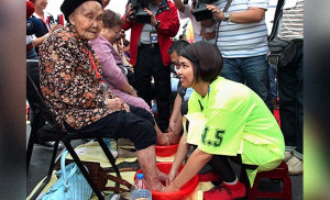 MOST PEOPLE FOOT WASHING TOGETHER