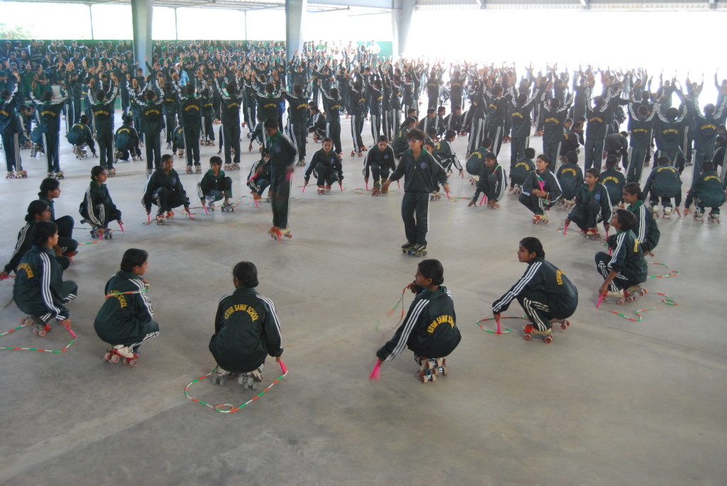 MOST GIRLS PERFORMING DANCE WHILE SKATING