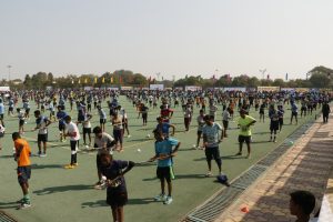 MOST PARTICIPANTS JUGGLING HOCKEY BALL TOGEHER