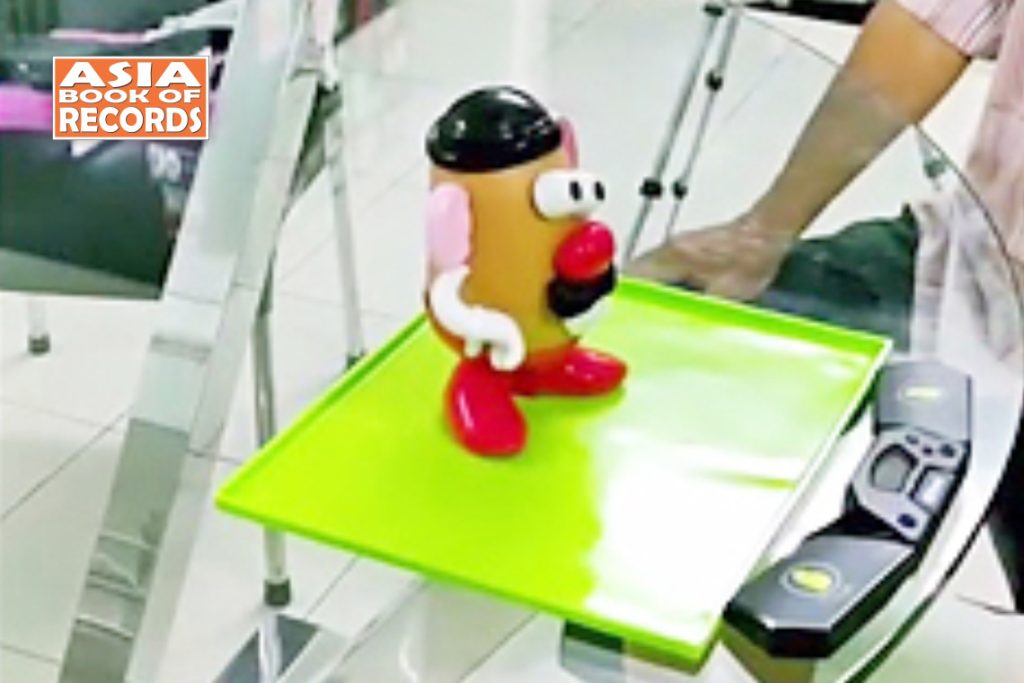 Fastest to solve Mr. Potato head puzzle by an individual Asia Book of