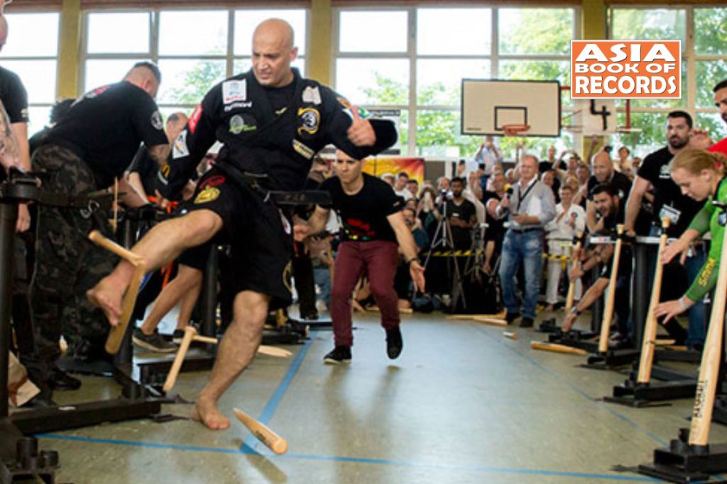 Fastest person to break 20 baseball bats with the shin Asia Book of