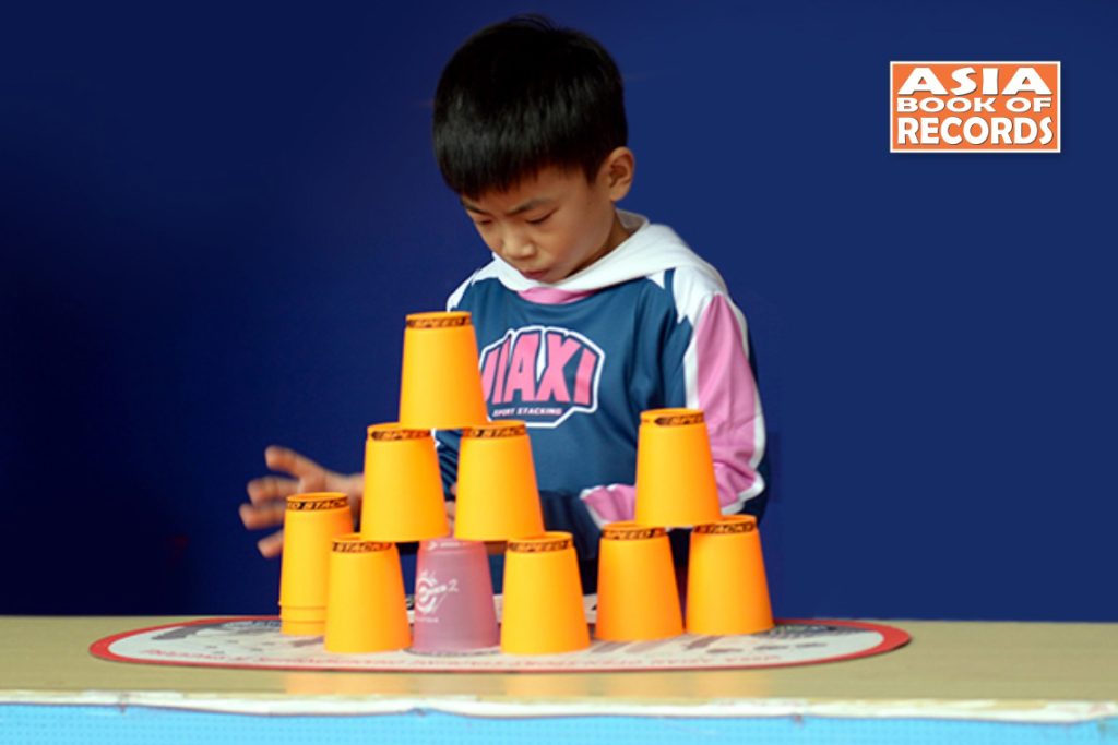 Fastest kid to perform 10 individual 3-6-3 sport stacking stacks - Asia ...