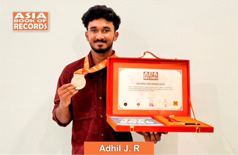 Image of Adhil J. R. with Grand Master Certificate.
