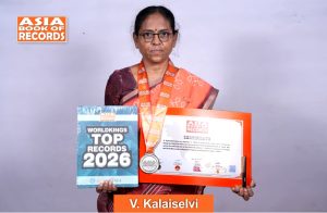 Image of V. Kalaiselvi, Fastest individual to write the mirrored text of the National Anthem in Tamil.