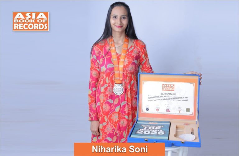 Fastest individual to write the Indian Pledge in mirror writing Image of Niharika Soni, Fastest individual to write the Indian Pledge in mirror writing.